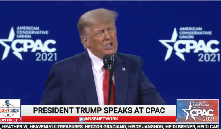 Trump Hugs And Air Kisses American Flag As He Takes The Stage For His CPAC Speech