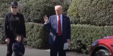 Donald Trump, Elon Musk and a Tesla at a White House event Tuesday (YouTube screenshot- AS TV)