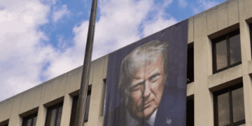The president's face on the side of the Labor Department (X screenshot)
