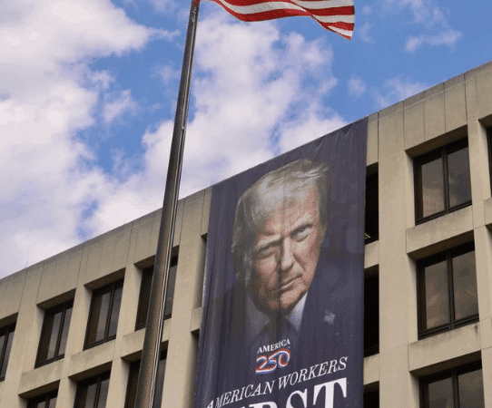 Massive Trump Portrait Hung On U.S. Government Building Sparks Alarm: ‘Scary Times’
