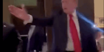 Trump confronts protesters at Joe's Seafood (X screenshot)